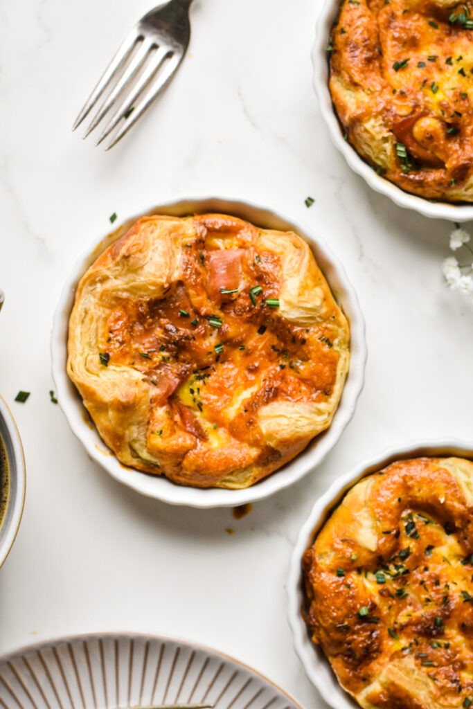 Overhead shot of a copycat panera souffle with chives on top.
