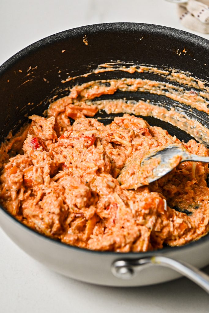 Ricotta dip mixture in a skillet.