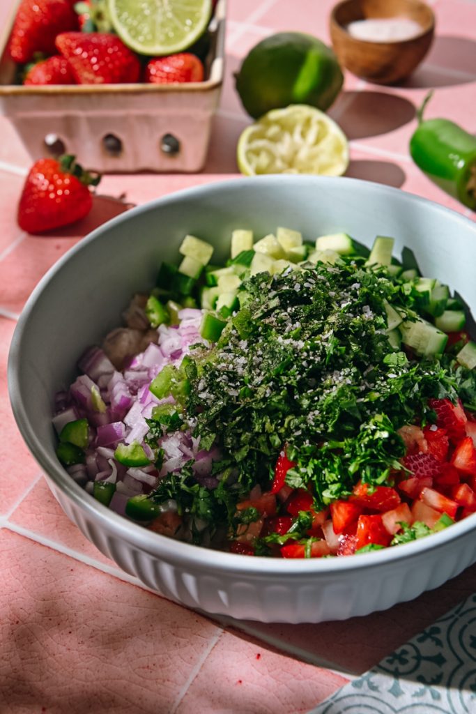 Salt and fresh cilantro added to the bowl.