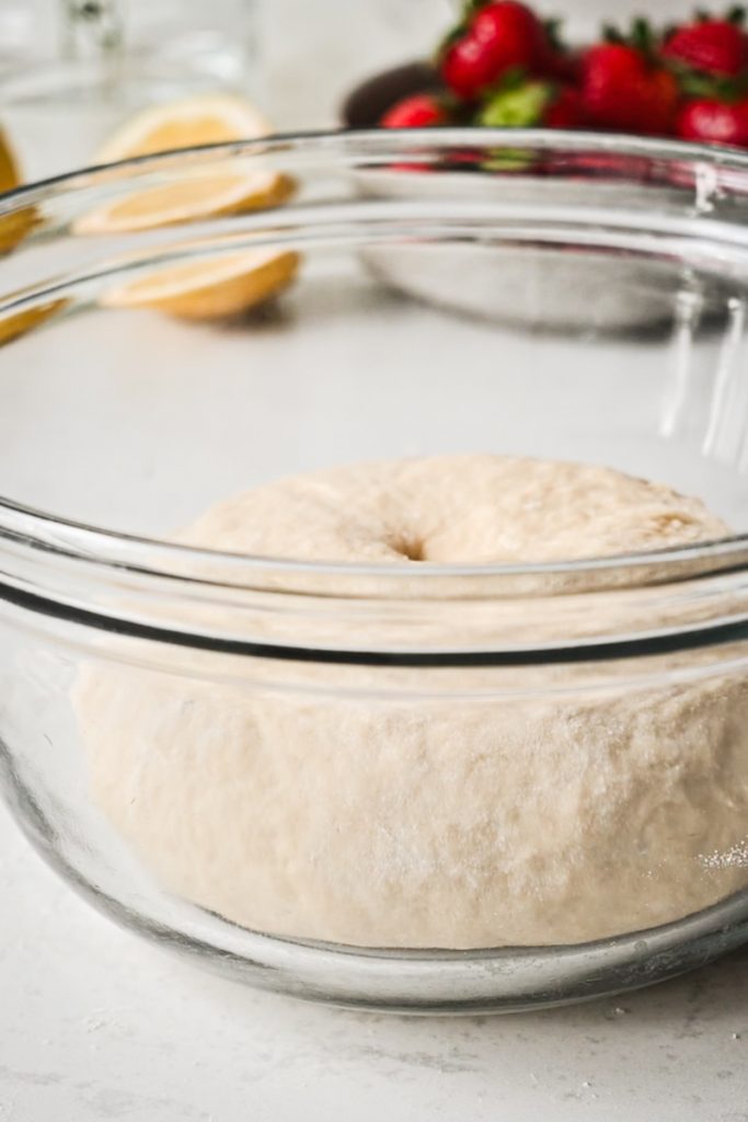 Strawberry roll dough in a bowl to rise.