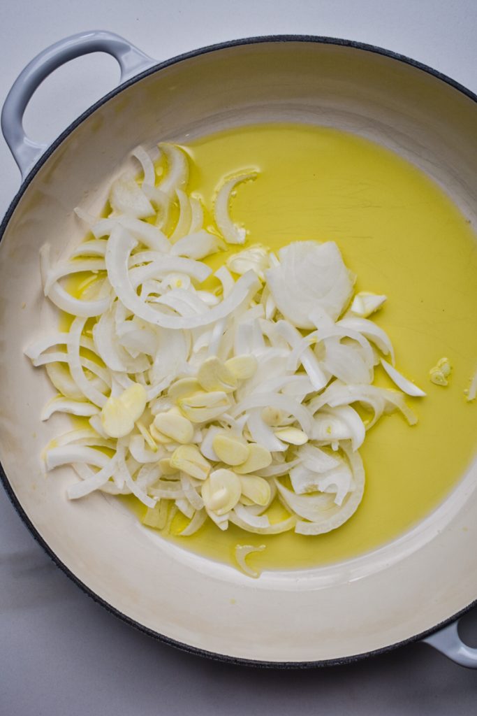 Onions and garlic in a skillet with olive oil.