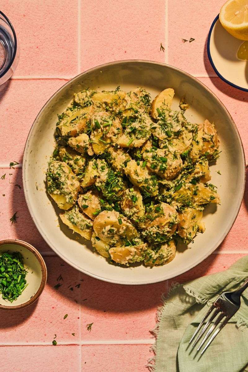 Overhead shot of tonnato potato salad in a bowl.