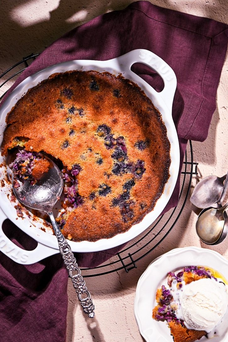 Overhead shot of blueberry rhubarb gratin in a baking dish.