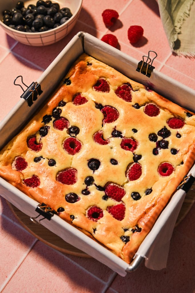 Baked crust-less yogurt cheesecake in a baking pan.