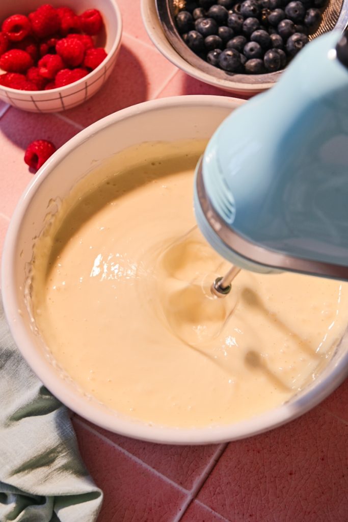 Whisking the batter in a bowl.